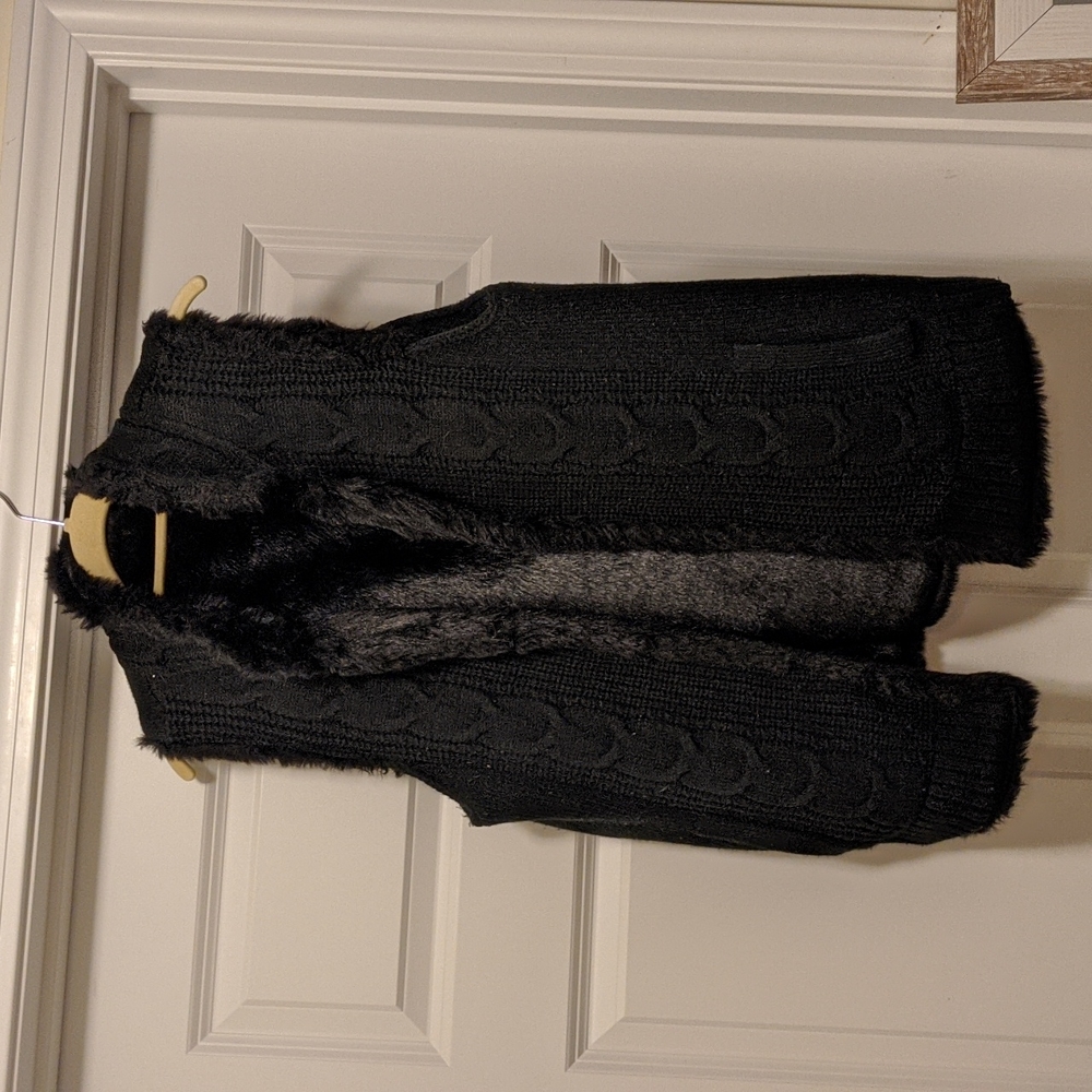Beautiful reversible faux fur and cable knit vest